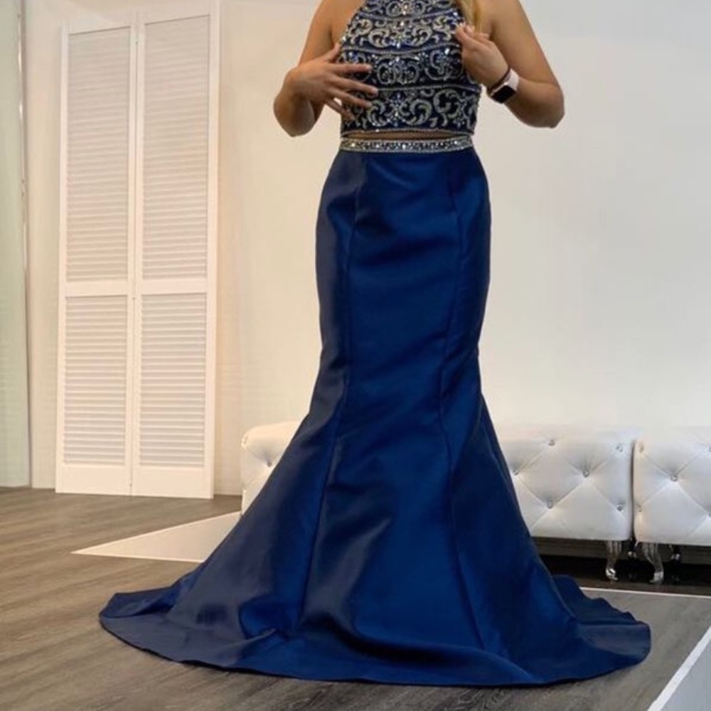 I have a brand new never used Exclusive Navy Dress